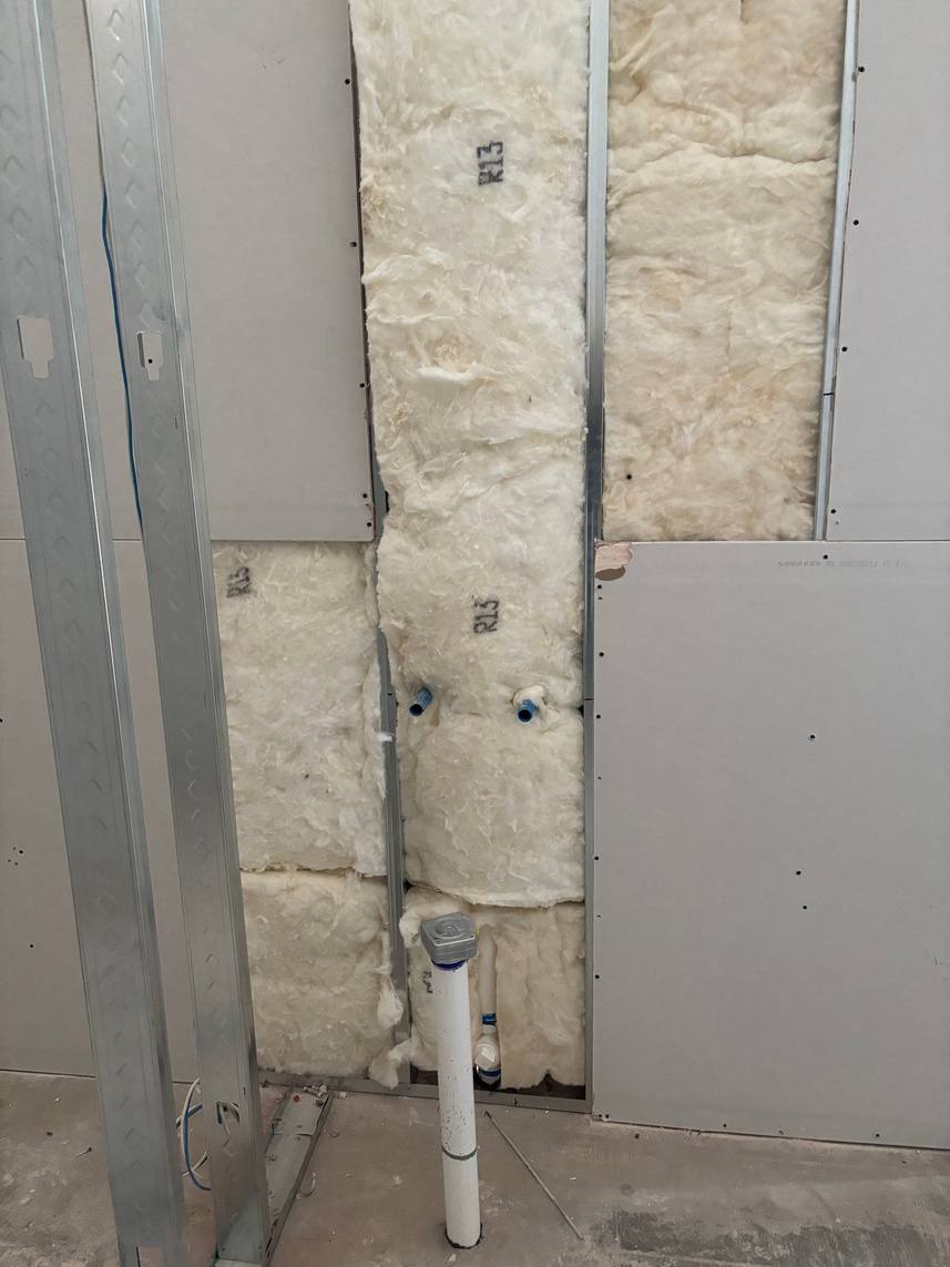 Batt insulation between metal studs