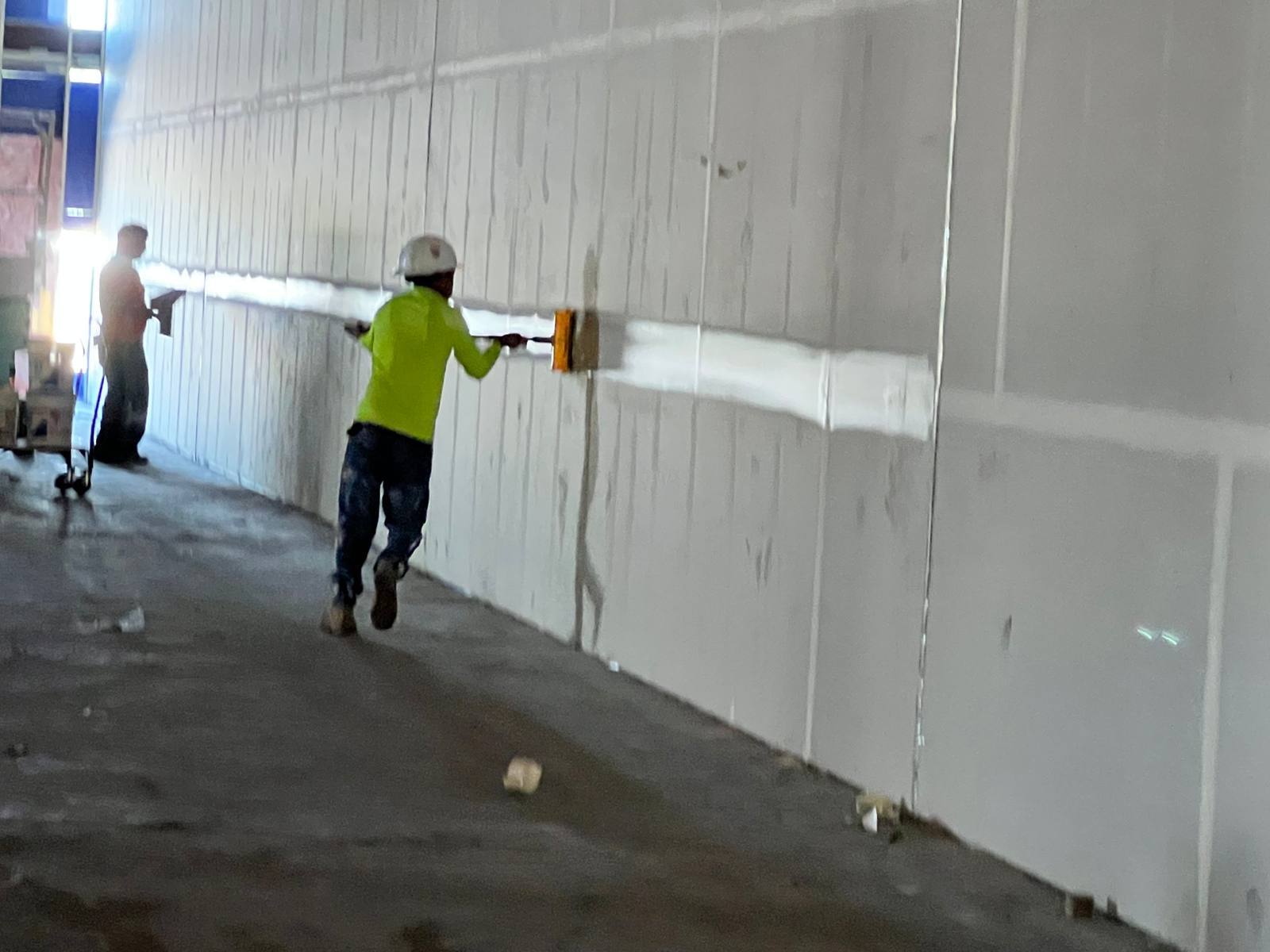 Crew hanging drywall